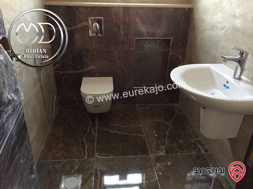 شقة شبه ارضي جديدة للبيع في عمان - ام السماق مساحة 200م مع ترس و حديقة 200م تشطيبات ديكورات سوبر ديلوكس بسعر مميز