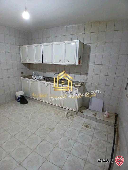 شقة فارغة طابق شبه ارضي مساحة 100م مع ترس 20م للإيجار في عمان - تلاع العلي 