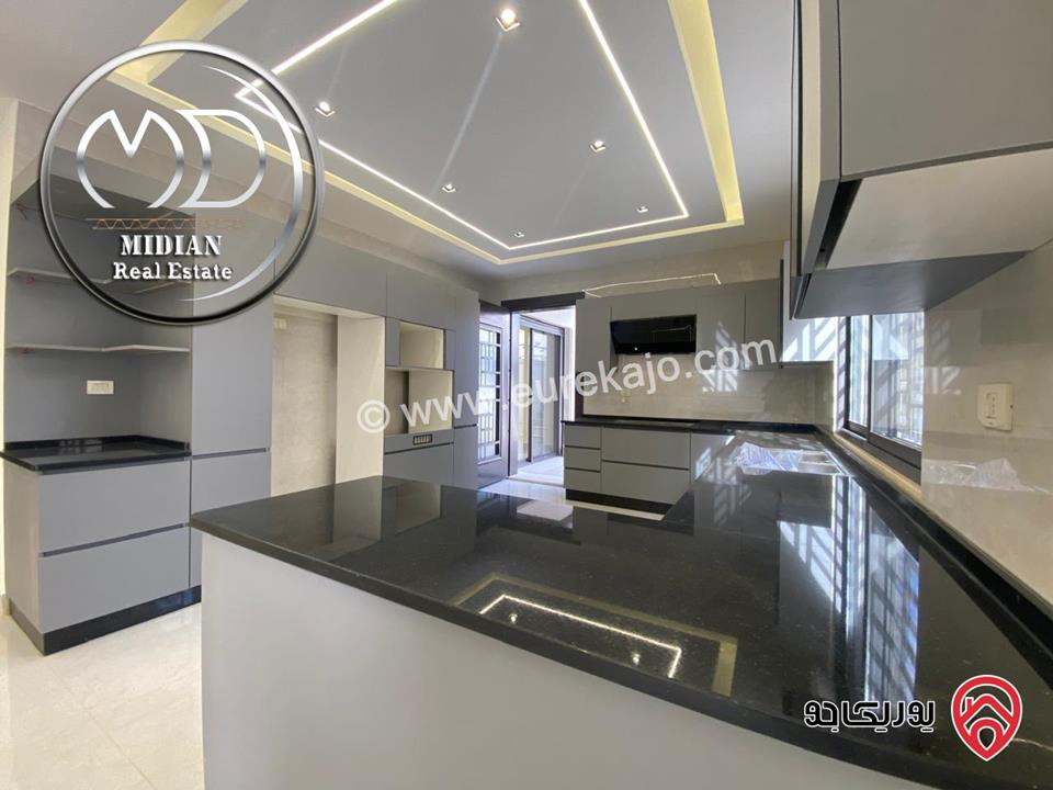 شقة جديدة شبه ارضي فارغة للايجار في عمان - دابوق مساحة 200م مع تراسات 150م تشطيبات وديكورات عصرية فاخرة