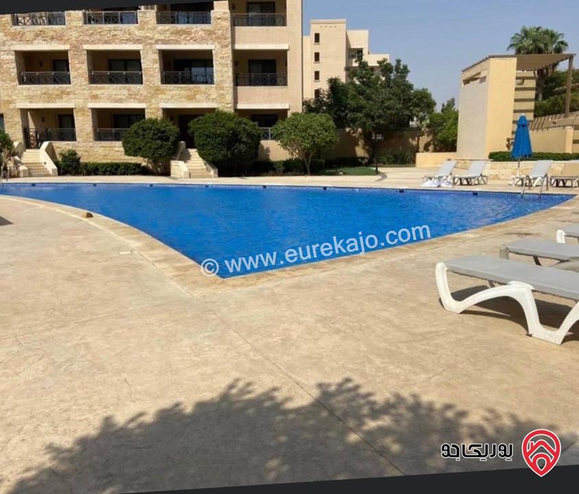 شقة مميزة مفروشة فرش كامل مساحة 155م مع اطلالة خلابة على البرك والبحر للبيع داخل منتجع سمارة البحر الميت