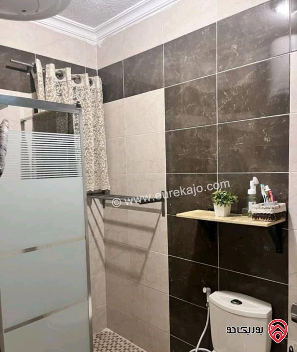 شقة طابق أول مساحة 105م للبيع في عمان - البنيات