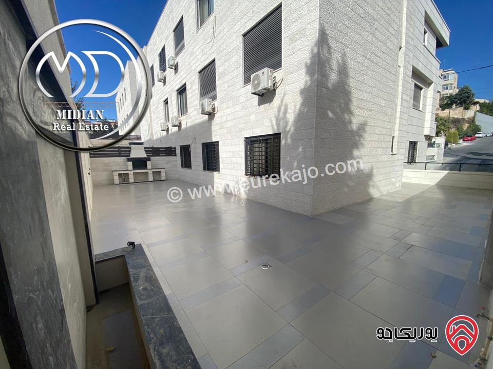 شقة جديدة شبه ارضي فارغة للايجار في عمان - دابوق مساحة 200م مع تراسات 150م تشطيبات وديكورات عصرية فاخرة