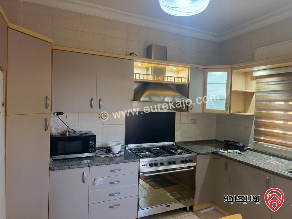 شقة طابق أرضي مساحة 173م مع ترس 60م مفروشة للبيع في عمان - الرابية