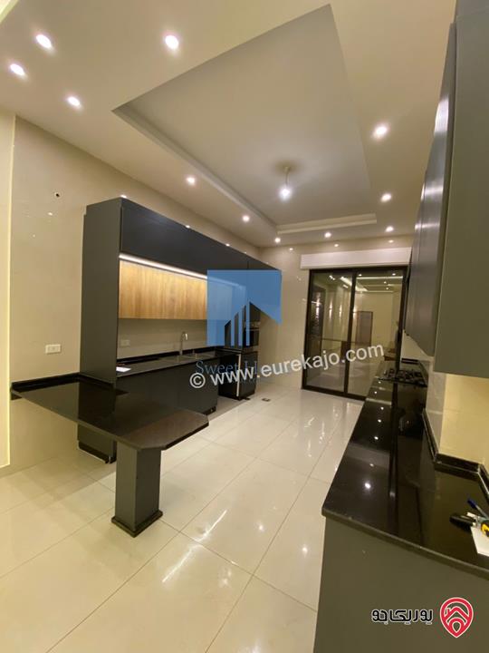 شقة أرضية 210م مع ترسات 170م للبيع في عمان - عرقوب خلدا - قرب خزان ماء (حاووز)