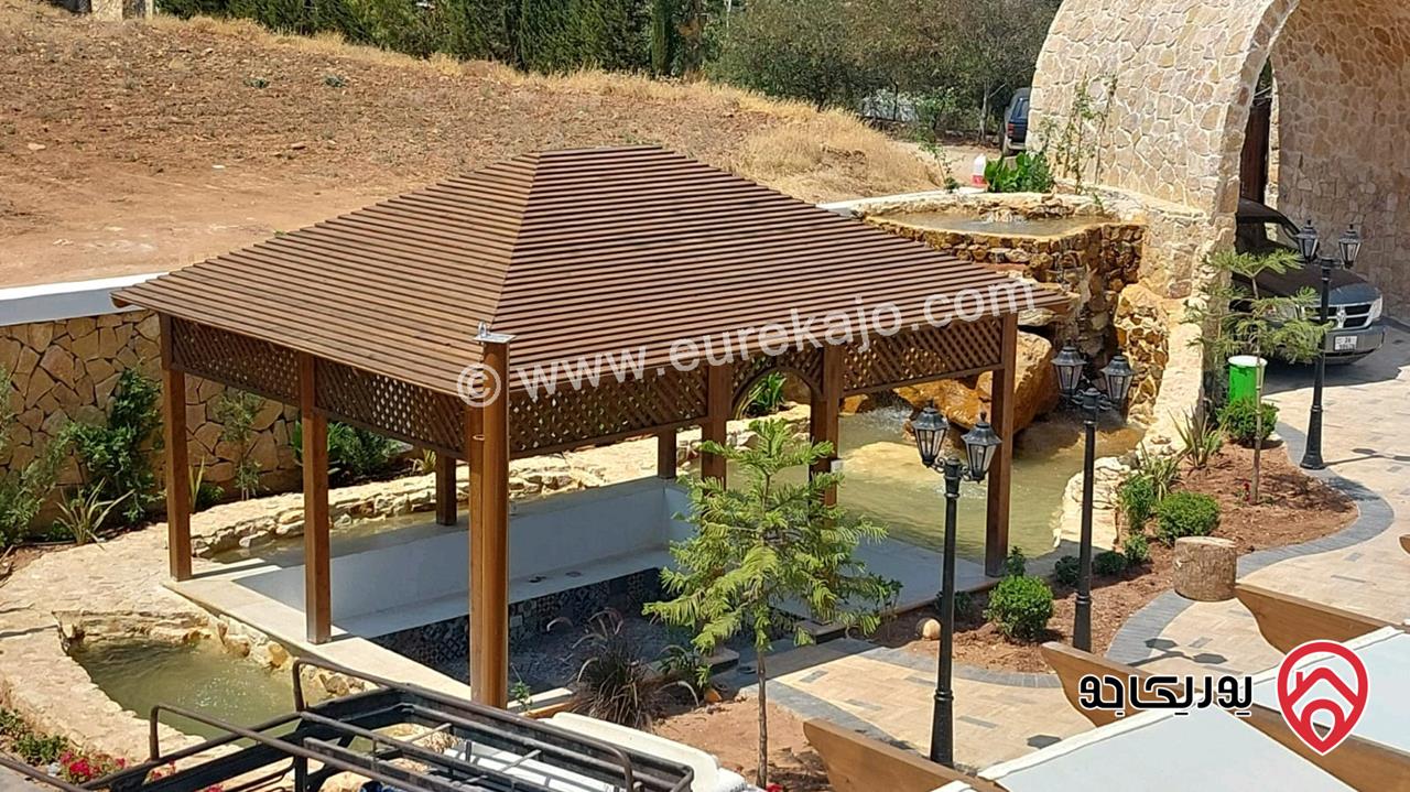 مزرعة فاخرة ذات اطلالة مميزة مساحة 6050م وبناء 656م للبيع في البلقاء - بيوضة 