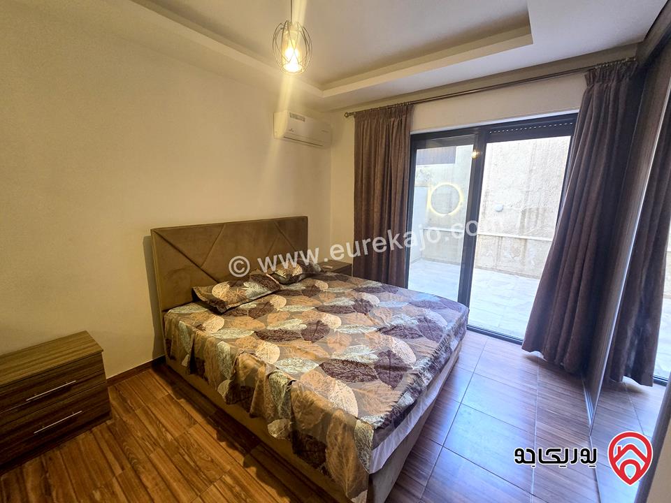 شقة ارضية مساحة 130م داخلي و 50م خارجي مع مدخل وكراج خاص للايجار مفروشة في عمان - ضاحية الامير راشد 