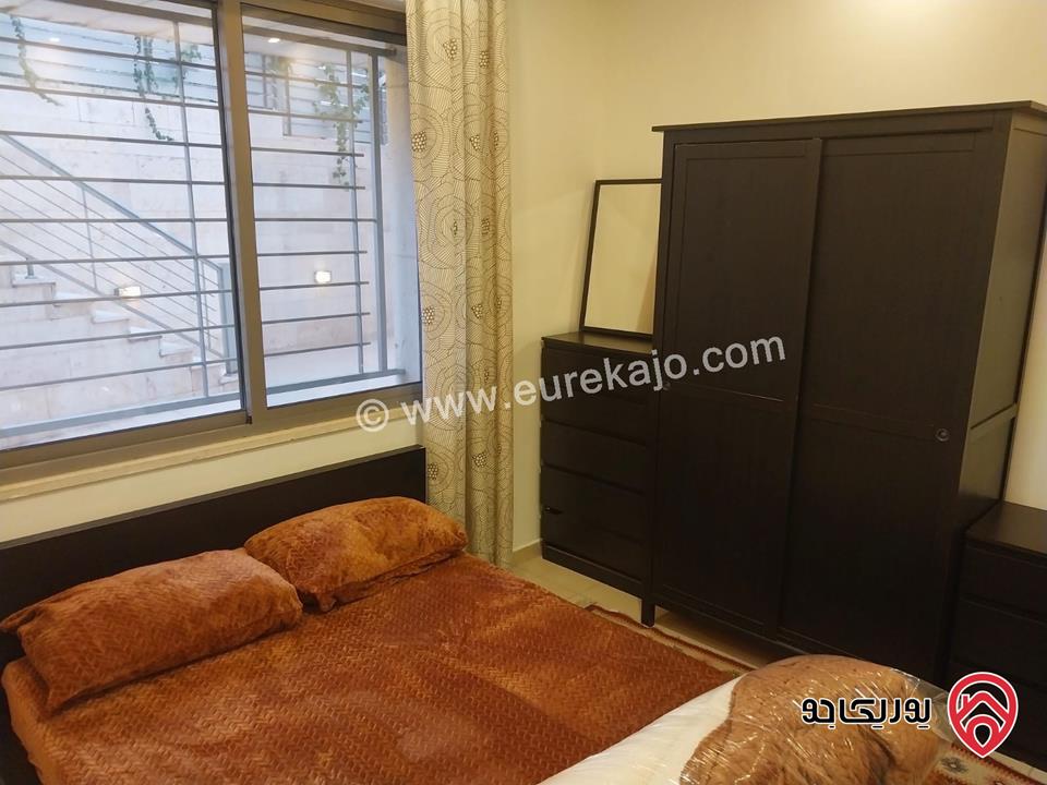 شقه للايجار في عمان - الدوار السابع مساحة 80م + 130م شبه ارضي قرب الترخيص