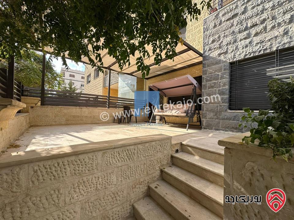 شقة أرضية مميزة للبيع في عمان - الجندويل قرب مركز أمن البيادر 180م مع حديقة وترسات 200م