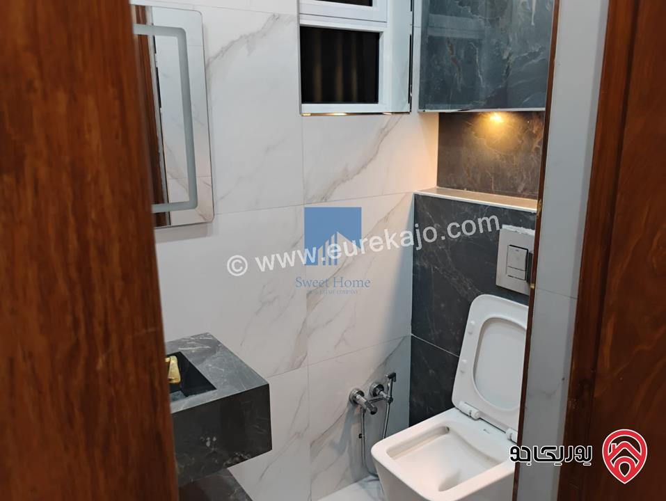 شقة أرضية مساحة 225م مع حديقة وترسات 100م تشطيب سوبر ديلوكس للبيع في عمان - خلدا