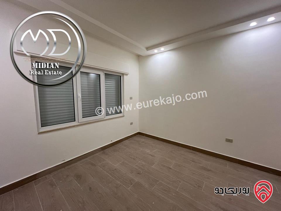 شقة أرضية للبيع في عمان - خلدا مساحة 185م مع ترس 40م تشطيبات سوبر ديلوكس جديدة لم تسكن بسعر مميز