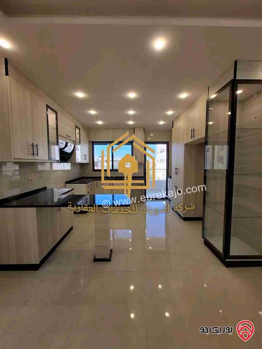 شقة جديدة لم تسكن طابق ثاني مساحة 150م للإيجار في عمان - الجندويل 