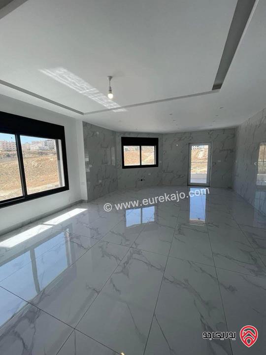 شقة فاخرة جديدة ارضية مساحة 188م داخلي و 90م خارجي للبيع في عمان - الجبيهة