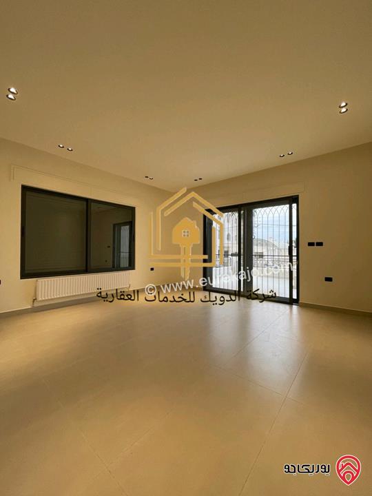 شقة جديدة لم تسكن طابق ارضي مساحة 165م داخلي و 150م خارجي للايجار في عمان - حي الصحابة 