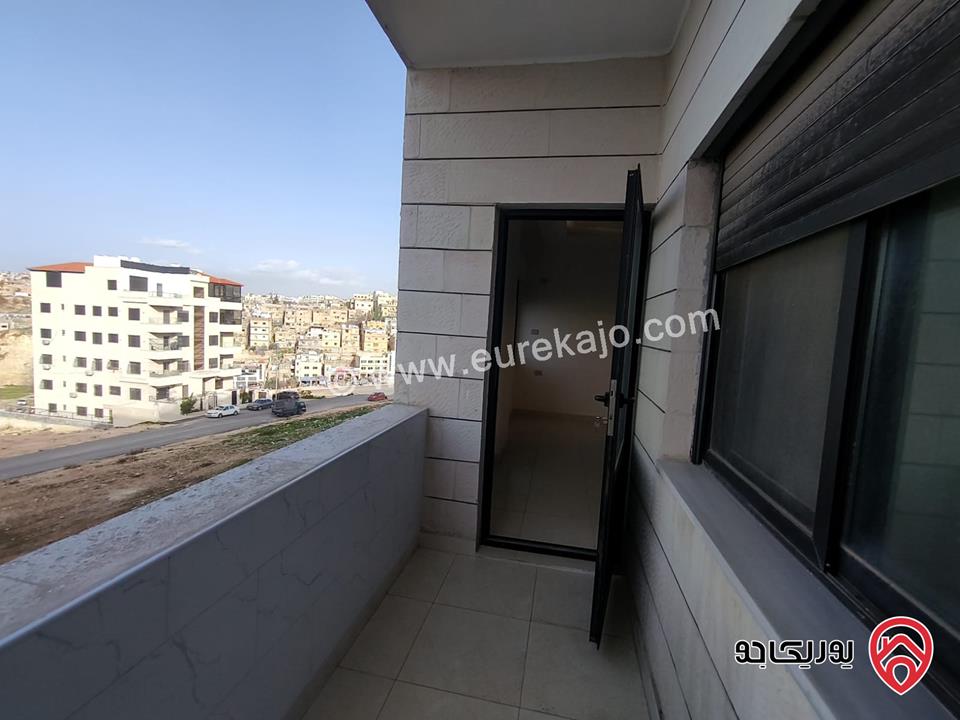 شقة ارضية مساحة 135م للبيع في عمان - جبل الزهور          	 