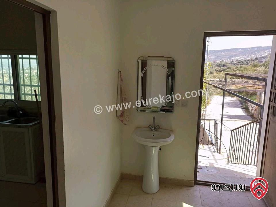 مزرعة زيتون مساحة الأرض 8 دونم و 300م و البناء مساحة 100م للبيع في السلط