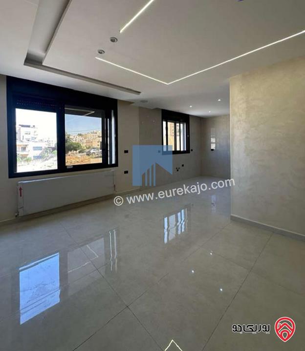 شقة فاخرة للبيع في عمان - تلاع العلي خلف طواحين الهوا 180م مع ترس 30م بسعر مغري لم تسكن