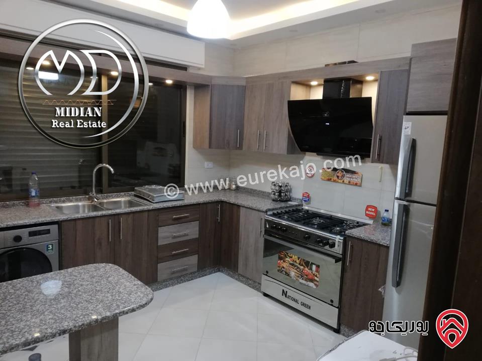 شقة ارضية مفروشة للايجار في عمان - ام السماق مساحة 130م مع ترس 100م تشطيبات و فرش سوبر ديلوكس