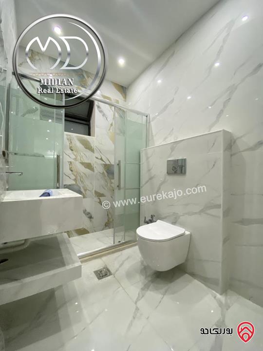 شقة دوبلكس طابق اخير مع روف للبيع في عمان - الرابية مساحة 230م تشطيبات سوبر ديلوكس اطلالة جميلة بسعر مميز