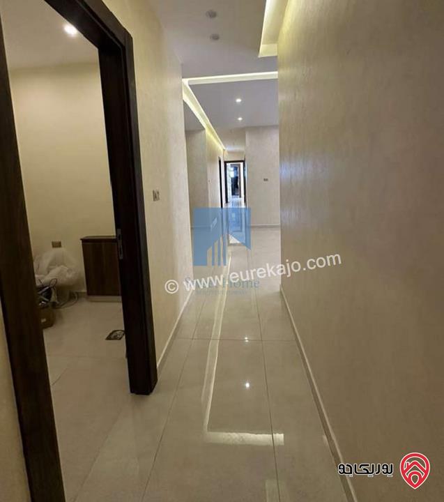 شقة أرضية فاخرة للبيع في عمان - تلاع العلي - خلف طواحين الهوا 180م مع ترس 40م لم تسكن