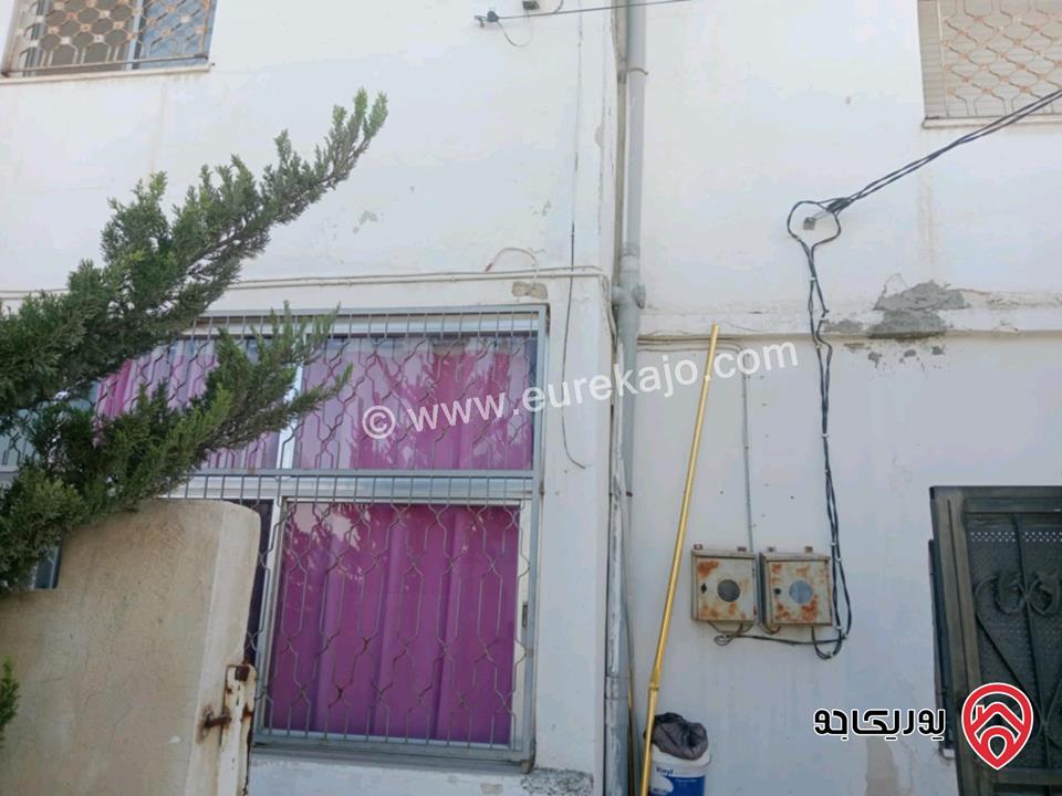 منزل طابقين + مستودع على أرض 446م للبيع في اربد - الحصن