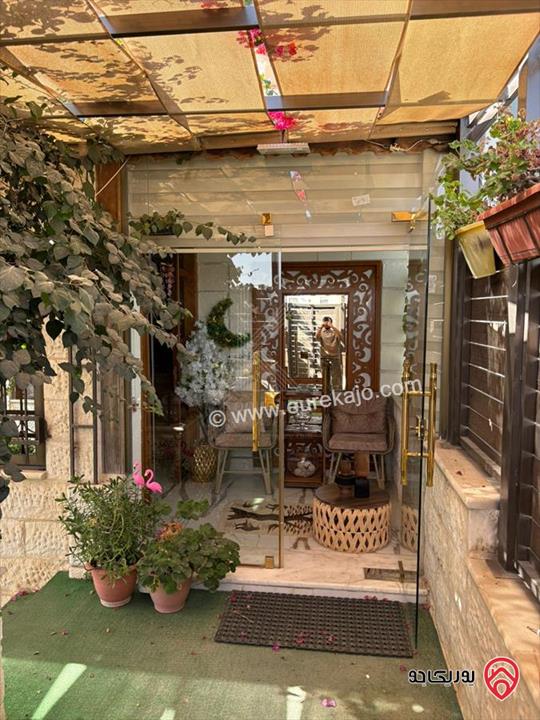 شقة مميزة شبه ارضية مساحة 197م داخلي و 150م خارجي للبيع في عمان - مرج الحمام / الطبقة