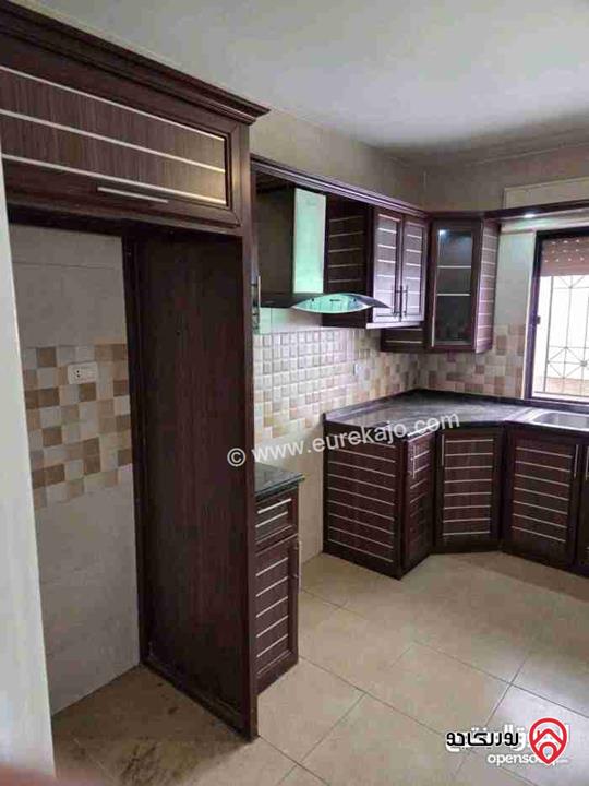 شقة فارغة مساحة 135م طابق ارضي مع ترس 20م للإيجار في عمان - تلاع العلي 