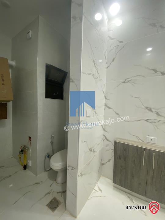 شقة فاخرة للبيع في عمان - خلدا قرب إشارة البنك العربي ومركز زها طابق ثاني 220م تشطيب سوبر ديلوكس لم تسكن