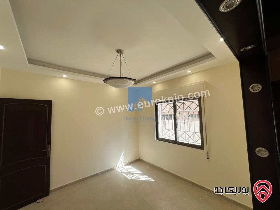 شقة أرضية مميزة مساحة 110م مع ترس 25م للبيع في عمان - الكرسي