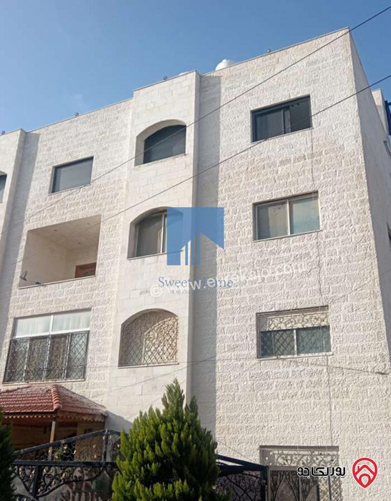 شقة مميزة شبه أرضية مساحة 90م مع حديقة وترسات 120م للبيع في عمان - خلدا