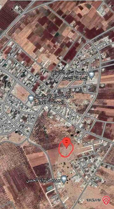 قطعة أرض صخرية للبيع مفروزة تنظيمي مساحة 818م في اربد منطقة سال