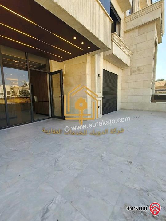 شقة جديدة لم تسكن أرضي مساحة 180م مع ترس 70م للإيجار في عمان - طريق المطار 