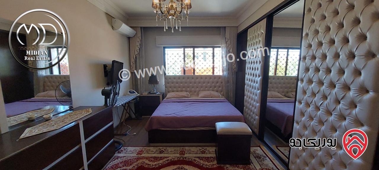 شقة ارضية مفروشة للايجار في عمان - الجاردنز مساحة 180م مع ترس و حديقة 200م تشطيبات و فرش سوبر ديلوكس