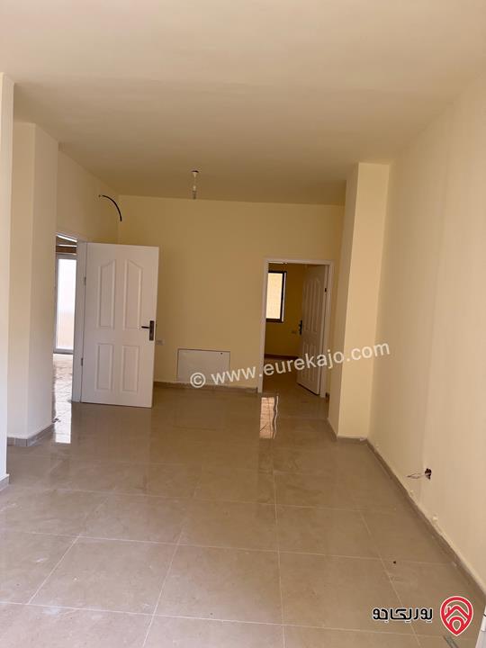 شقة طابق أول مساحة 128م للبيع في عمان - الجبل الأخضر حي نزال الشمالي 