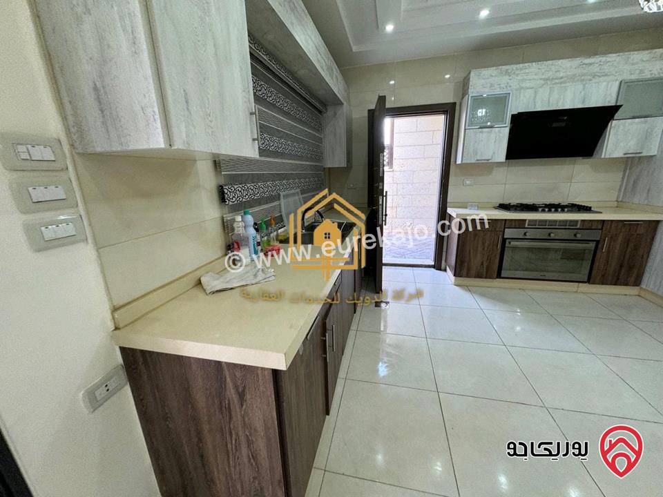 شقة سوبر ديلوكس طابق شبه ارضي مساحة 200م داخلي و 100م خارجي للايجار في عمان - طريق المطار 