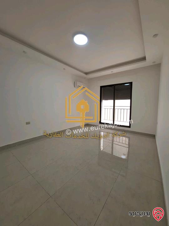 شقة جديدة لم تسكن طابق ثاني مساحة 150م للإيجار في عمان - الجندويل 