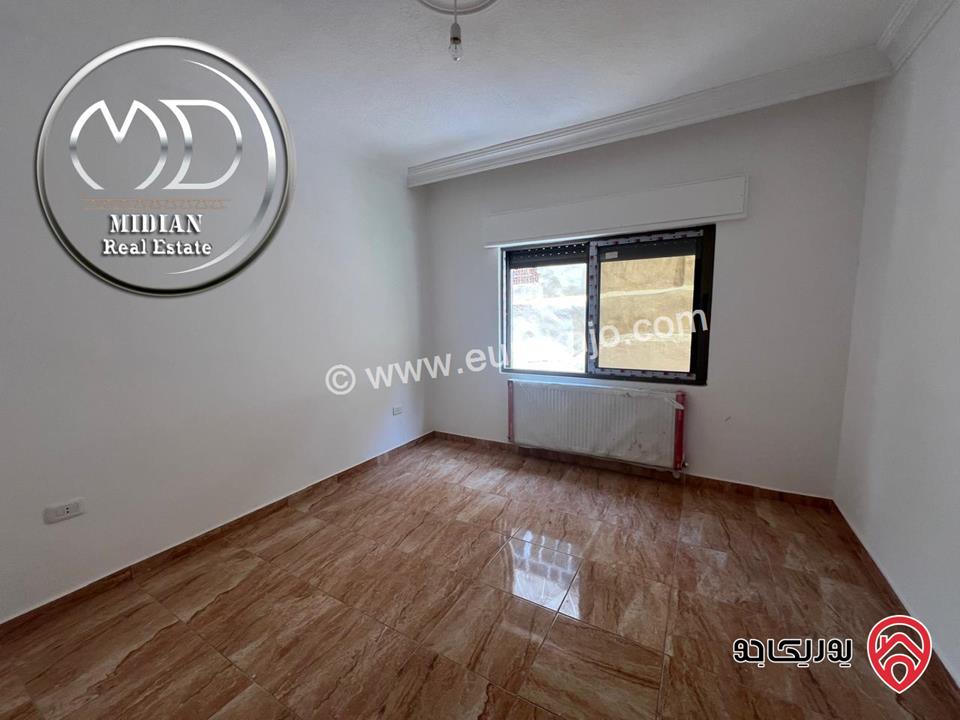 شقة ارضية جديدة فارغة للايجار في عمان - ضاحية الرشيد مساحة 150م مع ترس 50م تشطيبات سوبر ديلوكس بسعر مميز