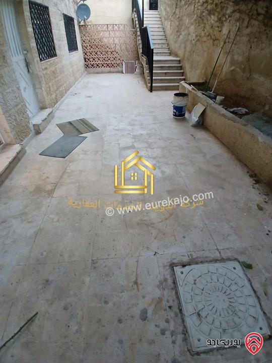 شقة فارغة طابق شبه ارضي مساحة 100م مع ترس 20م للإيجار في عمان - تلاع العلي 