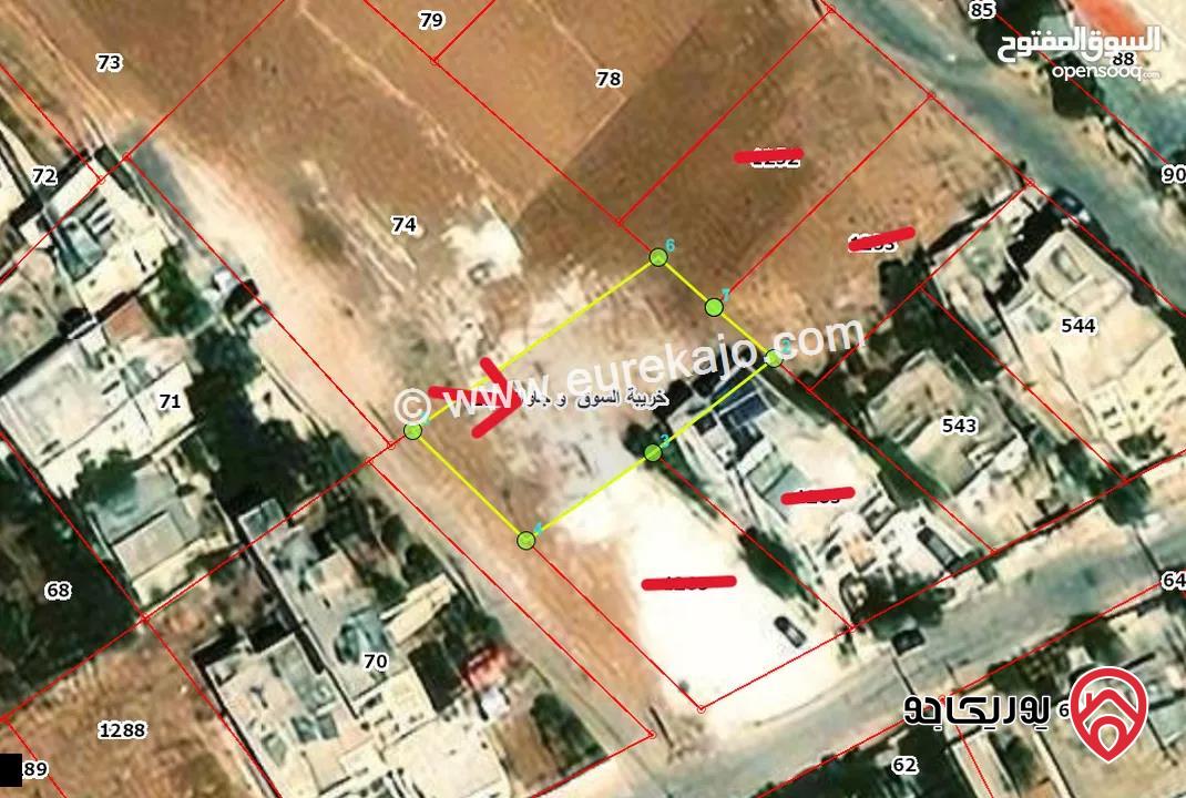 قطعة ارض مساحة 517م للبيع من أراضي جنوب عمان - خريبة السوق وجاوا على شارعين منطقة سكنية واصل كل الخدمات