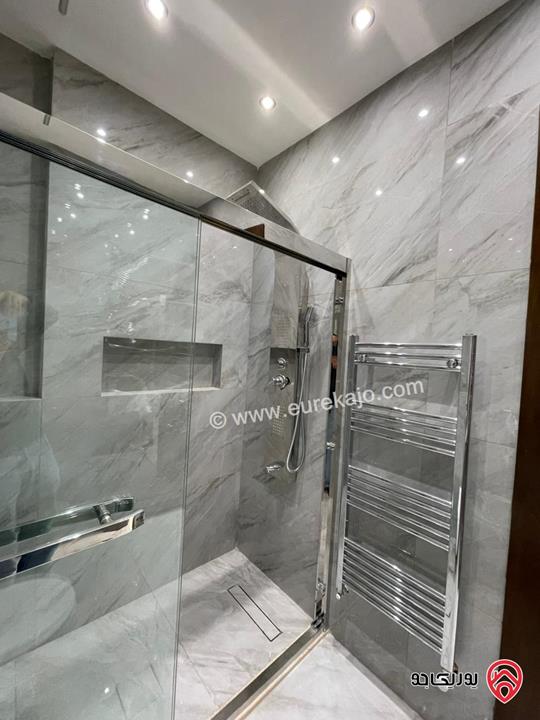 شقة تشطيب سوبر ديلوكس طابق أرضي مساحة 205م داخلي و 65م خارجي مع كراج ومدخل خاص للبيع في عمان - البنيات