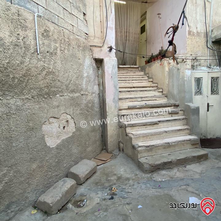 منزل مستقل مكون من طابقين ومخزنين على أرض 292م للبيع في عمان - ماركا