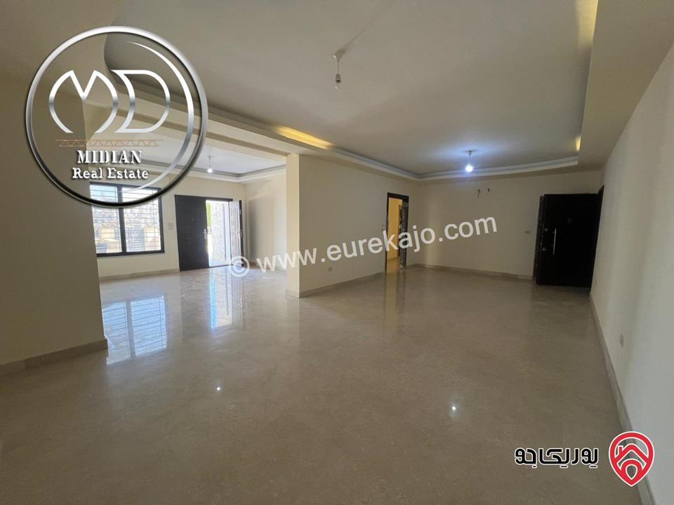 شقة شبه ارضي للبيع في عمان - ضاحية النخيل مساحة 190م مع ترس و حديقة 150م تشطيبات سوبر ديلوكس جديدة لم تسكن