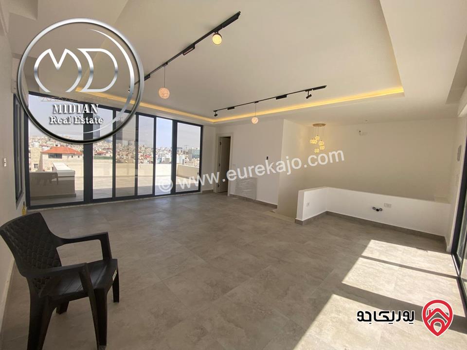 شقة دوبلكس جديدة طابق اخير مع روف للبيع في عمان - الجندويل مساحة 230م مع تراسات تشطيبات ديكورات عصرية اطلالة جميلة