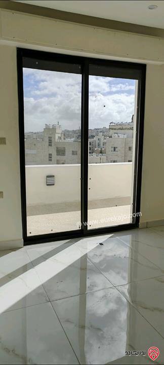 شقة جديدة مساحة 165م دوبلكس للبيع في عمان - الجبيهة شارع الاردن حي الديوان