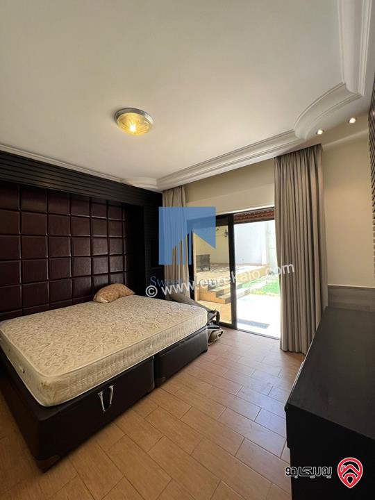 شقة أرضية مفروشة 200م مع حديقة وترسات 150م للبيع في جبل عمان 