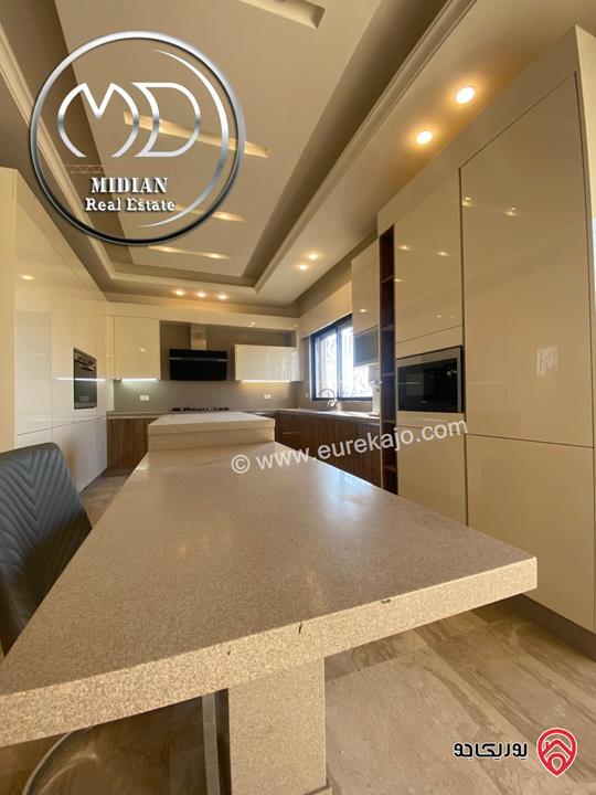 شقة للايجار طابق أخير مع روف في عمان - خلدا - العوجانية مساحة 425م مع تراسات تشطيبات ديكورات فاخرة اطلالة بانورامية خلابة