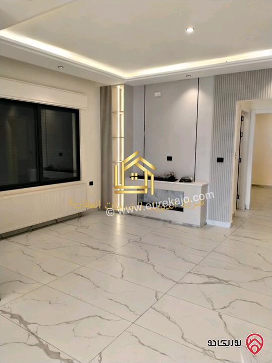 شقة جديدة طابق ثالث مساحة 205متر للإيجار في عمان - خلدا 