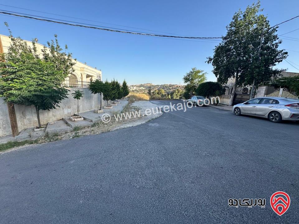 ارض مميزة مساحة 823م على شارعين مع منسوب للبيع في عمان - طبربور