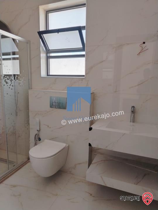 شقة فاخرة للبيع في عمان خلدا  - خلف المستشفى السعودي ومقابل ميداس طابق ثاني 217م لم تسكن بسعر مغري