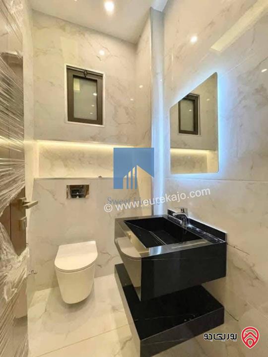 شقة فاخرة للبيع في عمان - خلدا قرب إشارة البنك العربي ومركز زها 220م مع ترسات 300م لم تسكن