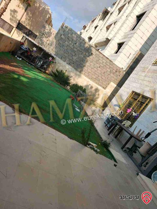 شقة مميزة شبه ارضية مساحة 200م داخلي و 120م خارجي للايجار في عمان - حي الصحابة 